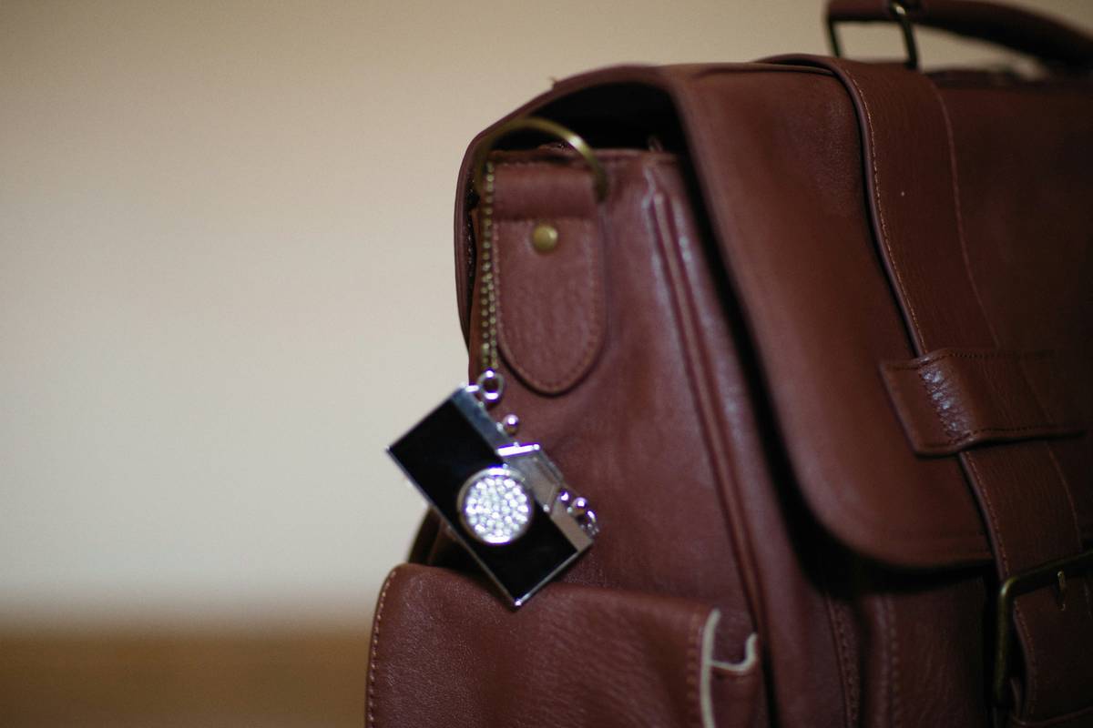 Close-up of portable studio luggage showcasing organized compartments for cameras, laptops, and accessories