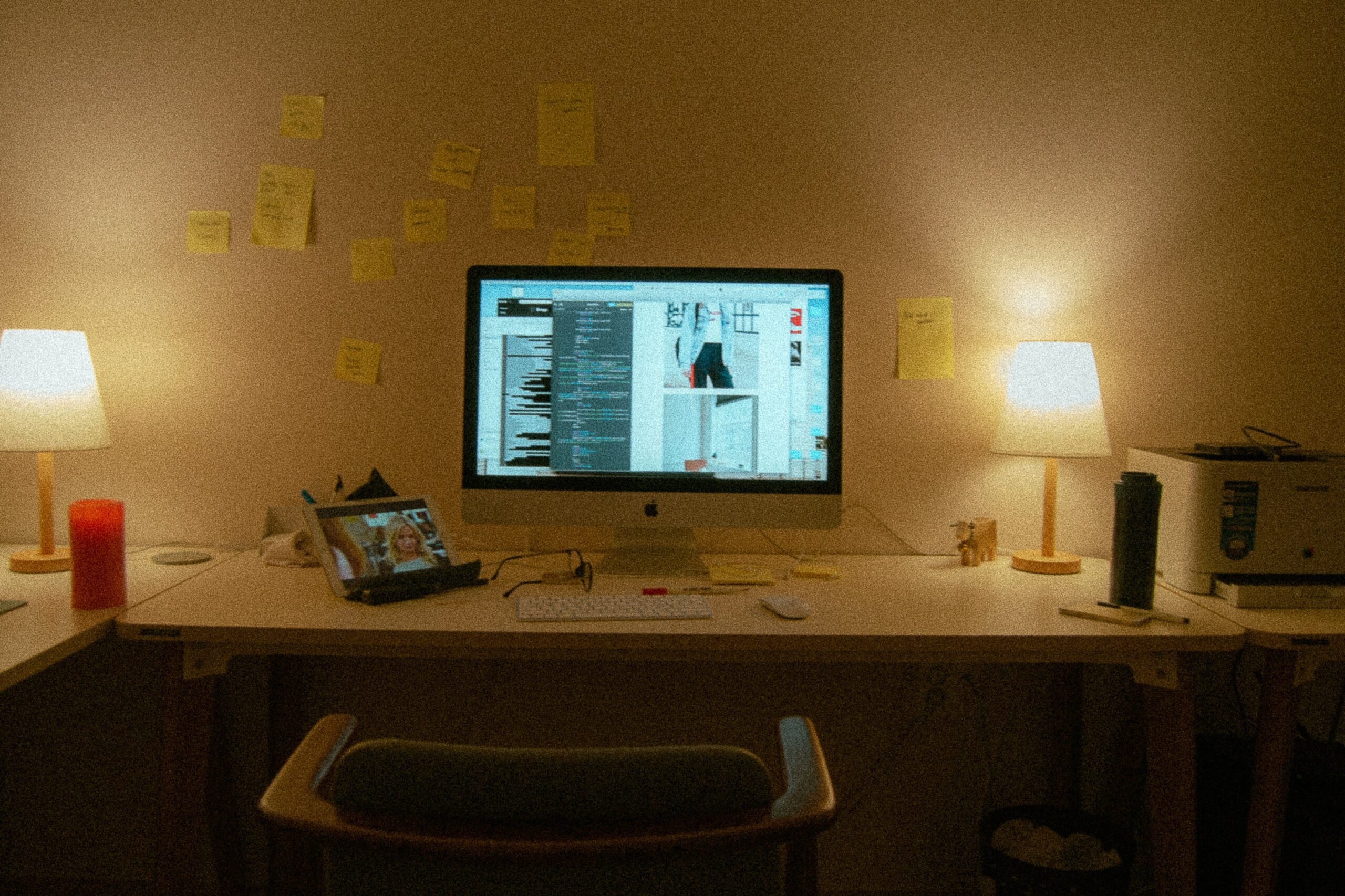 Traveler struggling with bulky gear while editing in a hotel room.
