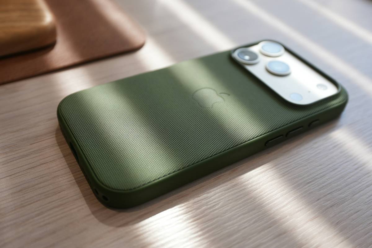 Influencer setting up a portable green screen in a hotel room